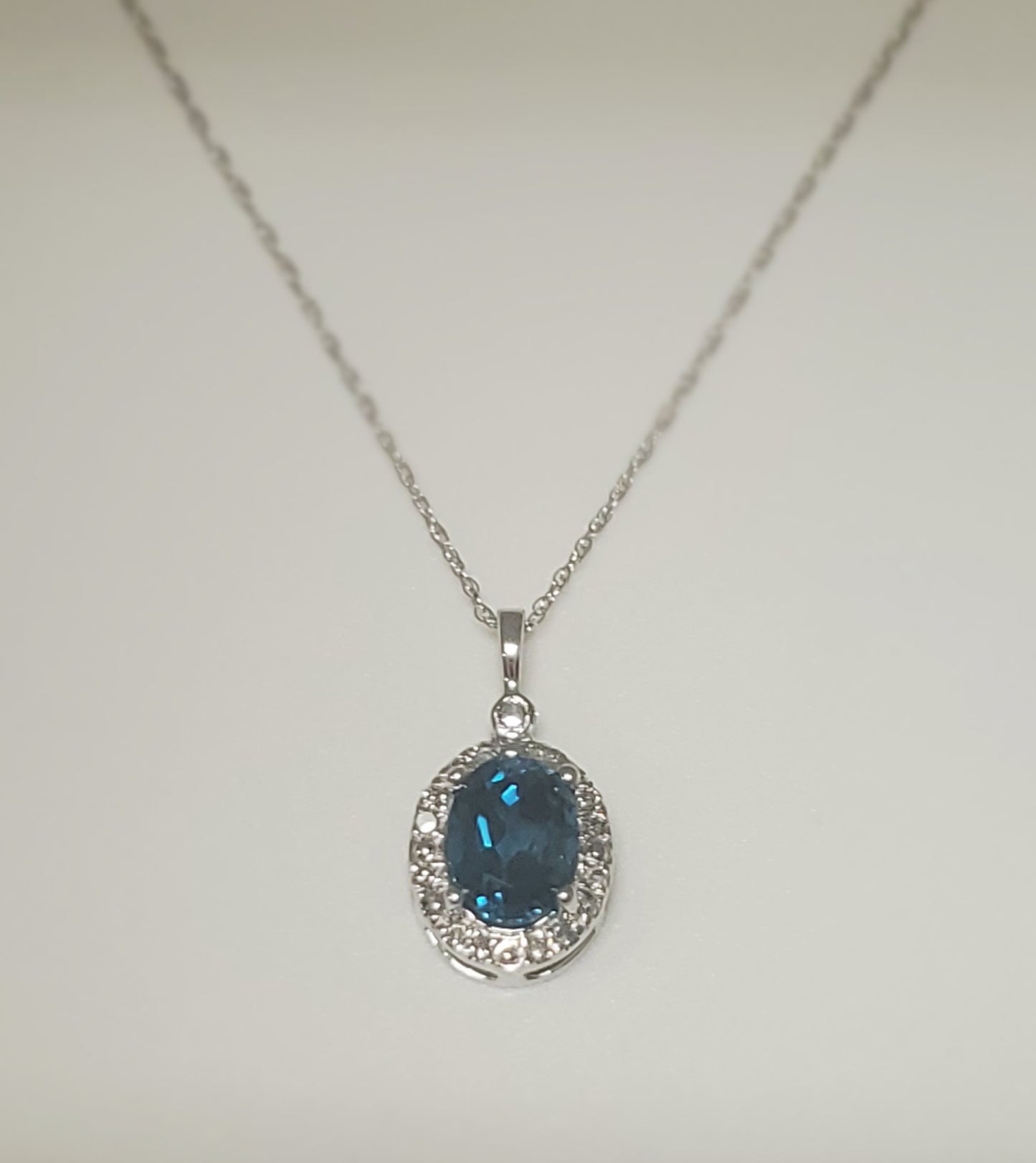 Oval London Blue Topaz and Diamond Pendant
