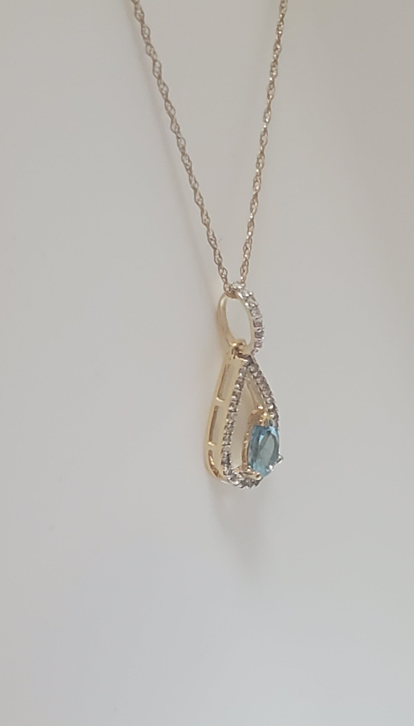 10k Yellow Gold Blue Topaz and Diamond Pendant
