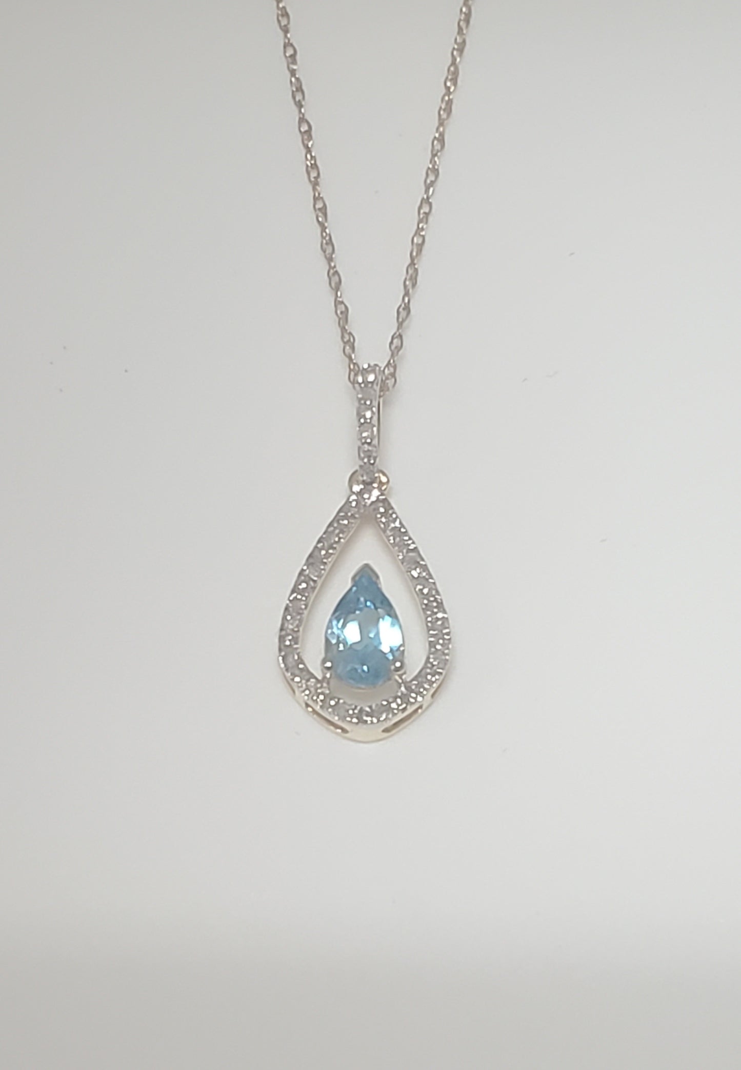 10k Yellow Gold Blue Topaz and Diamond Pendant