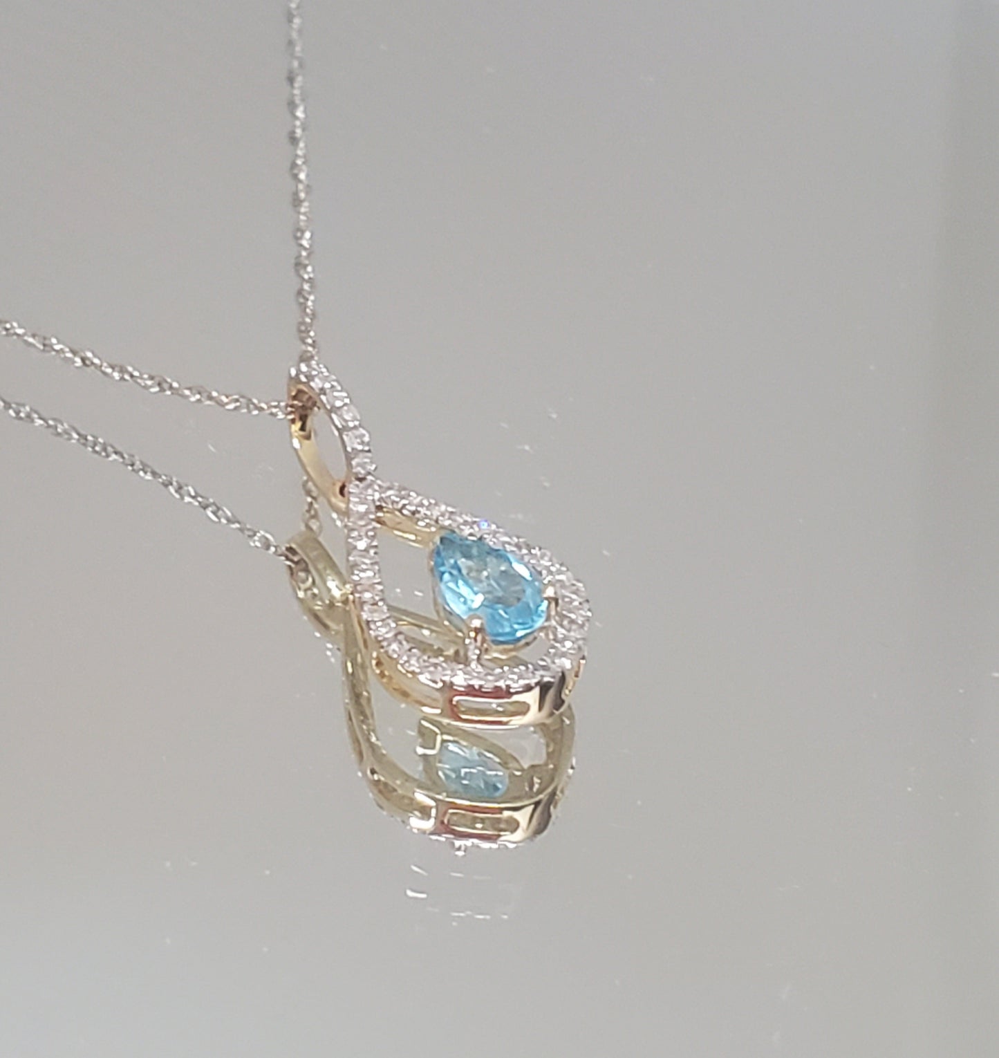 10k Yellow Gold Blue Topaz and Diamond Pendant