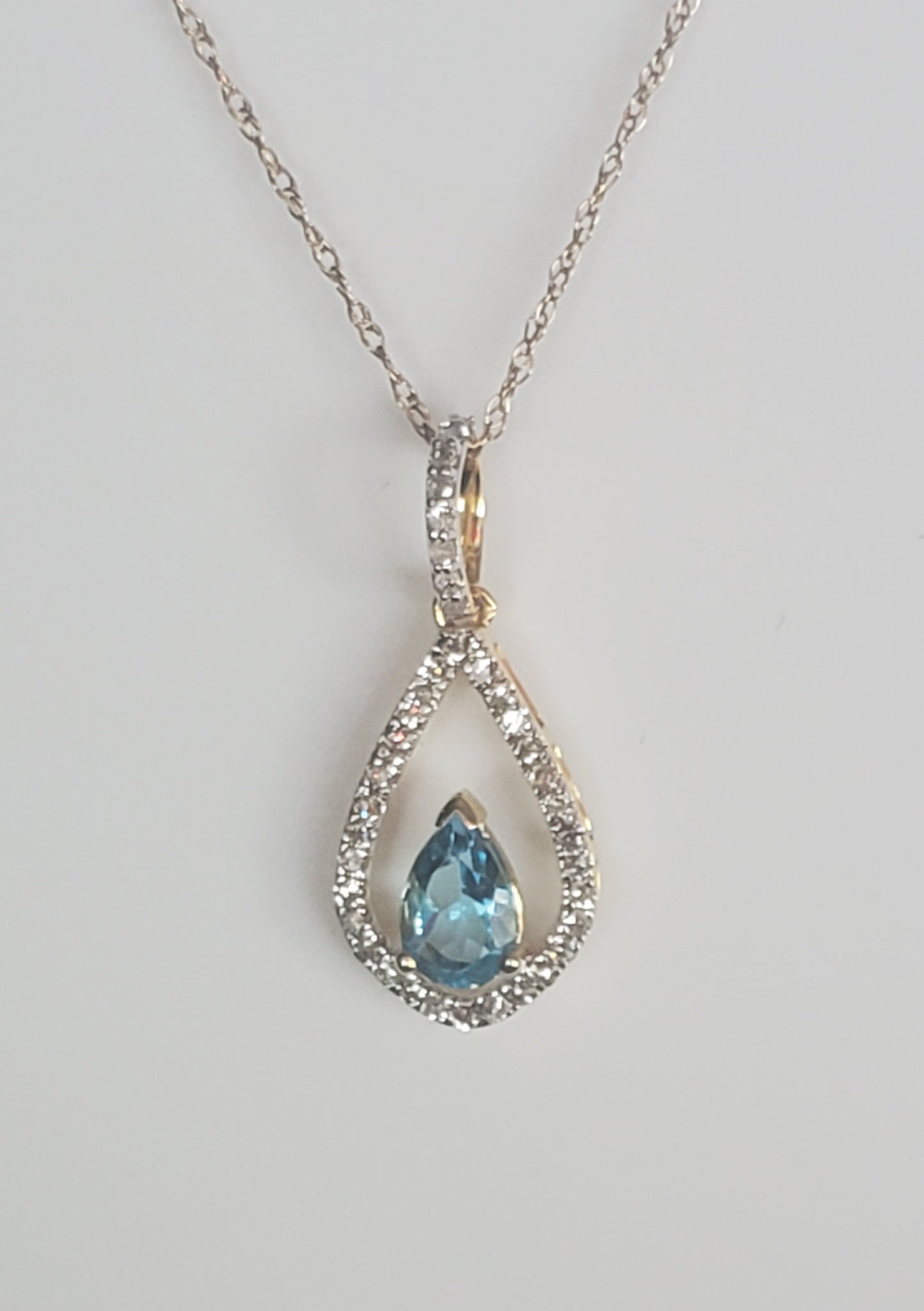 10k Yellow Gold Blue Topaz and Diamond Pendant