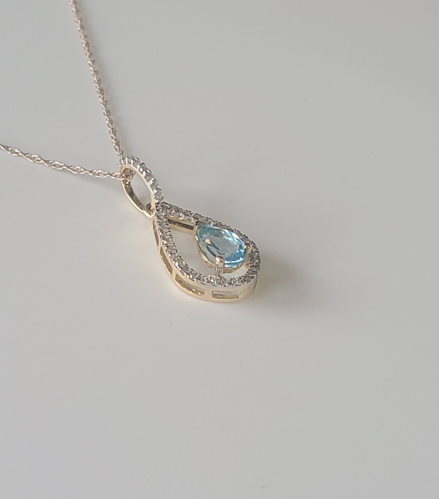 10k Yellow Gold Blue Topaz and Diamond Pendant