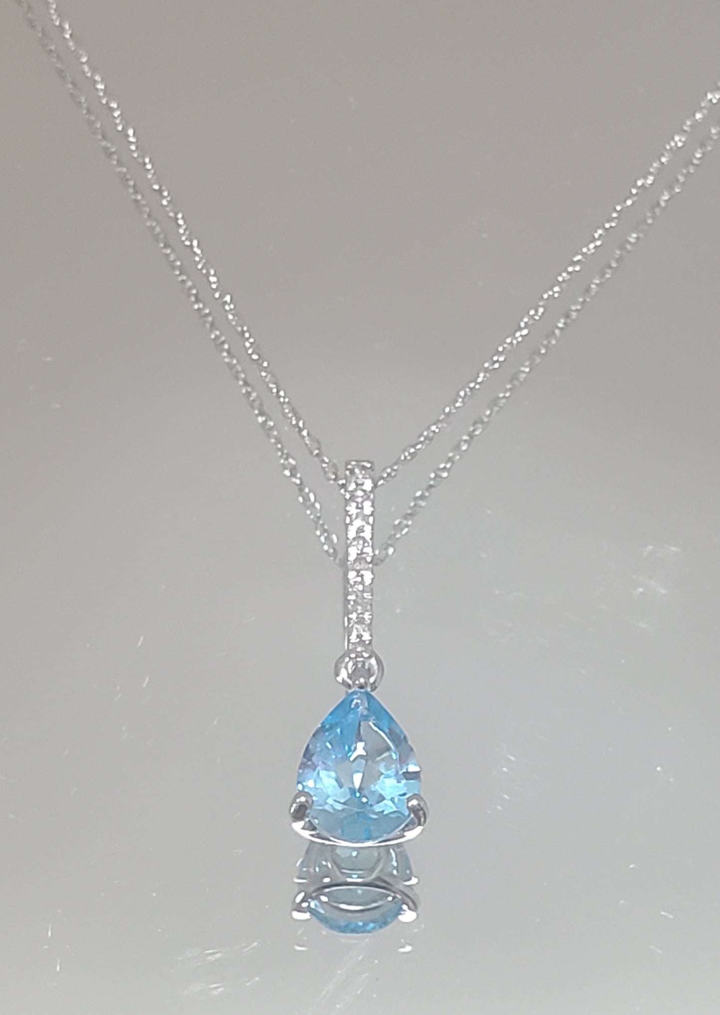 10k White Gold Diamond and Blue Topaz Teardrop Pendant