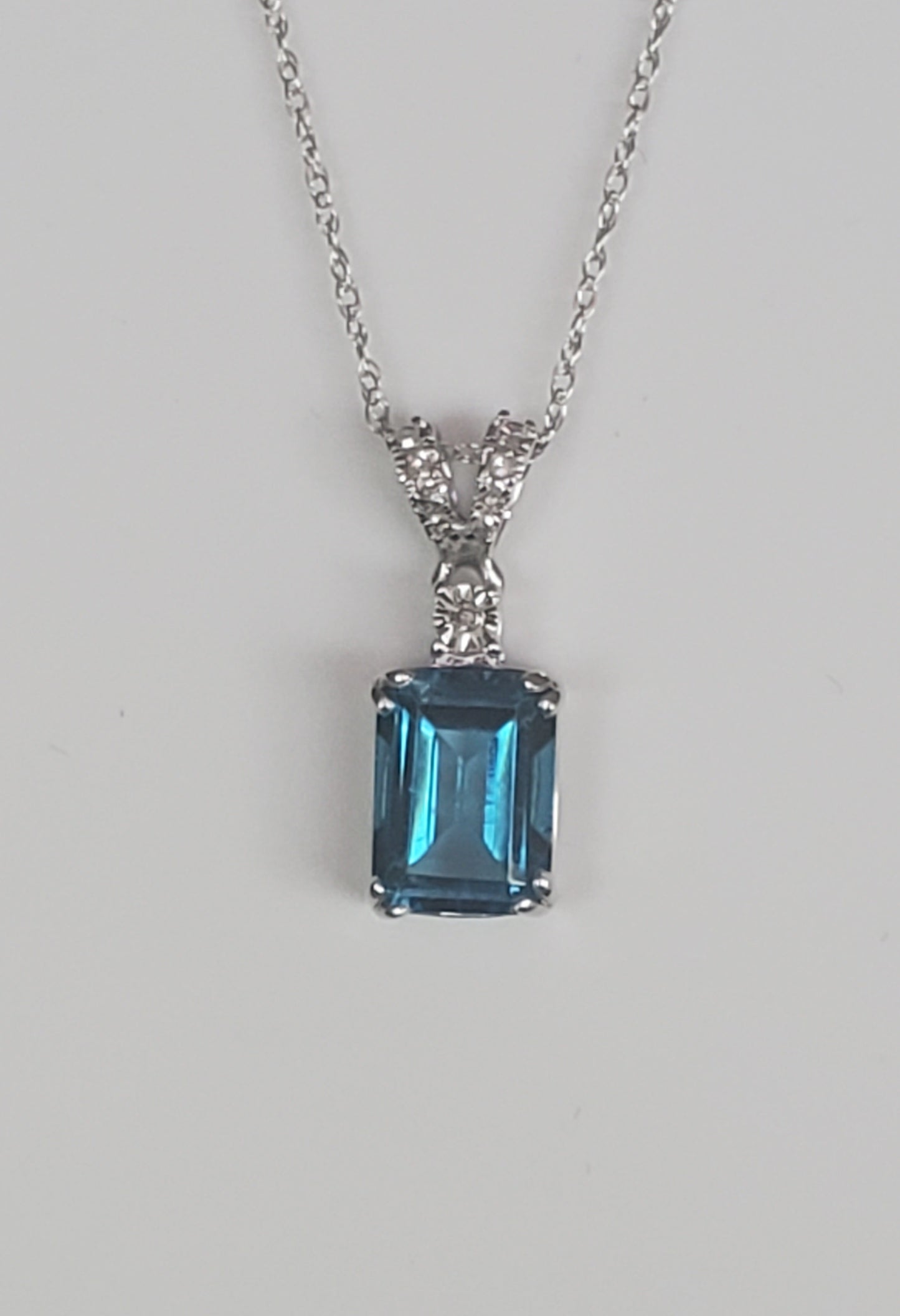 10k White Gold London Blue Topaz and Diamond Pendant