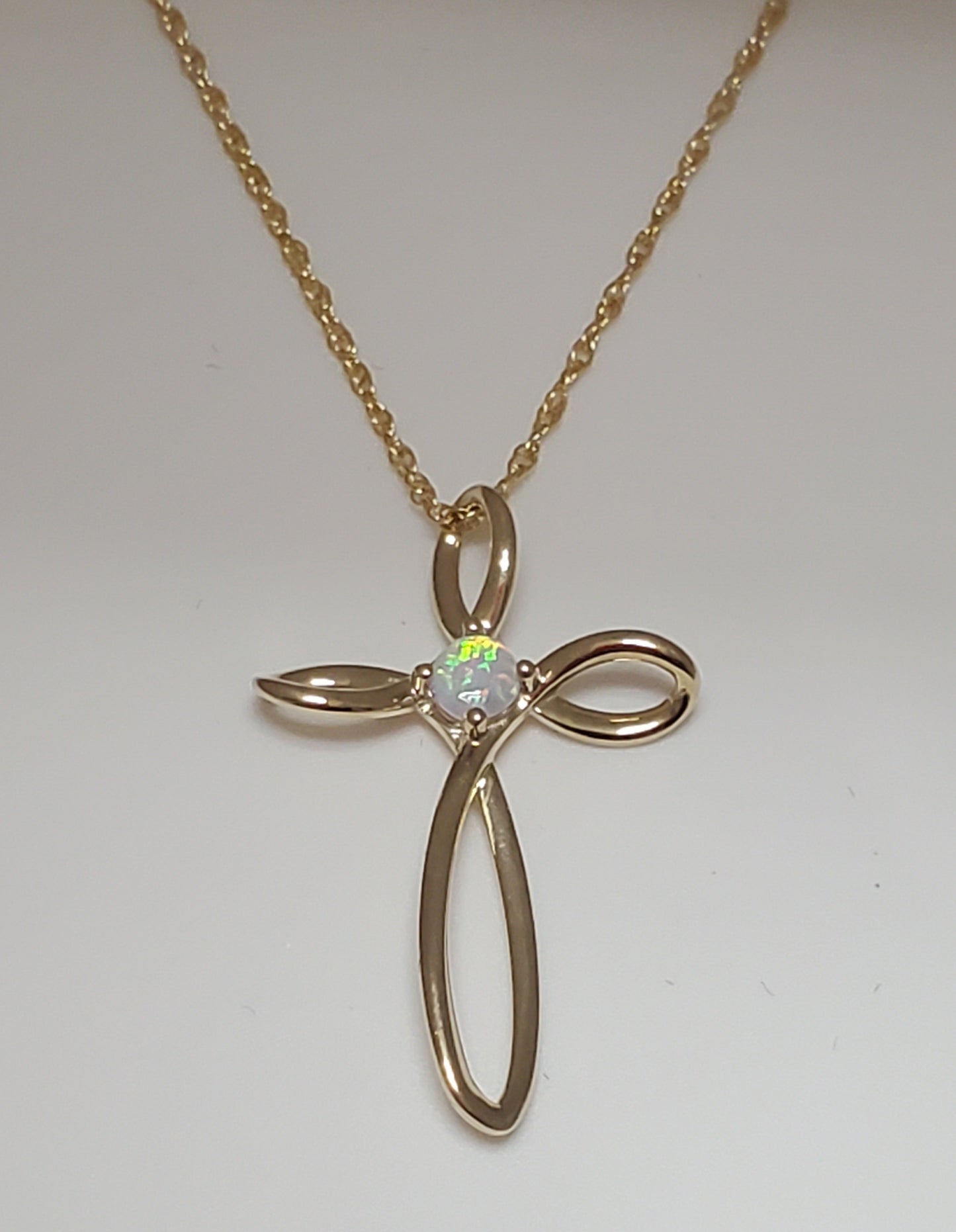 10k Yellow Gold Open Cross with Created Opal