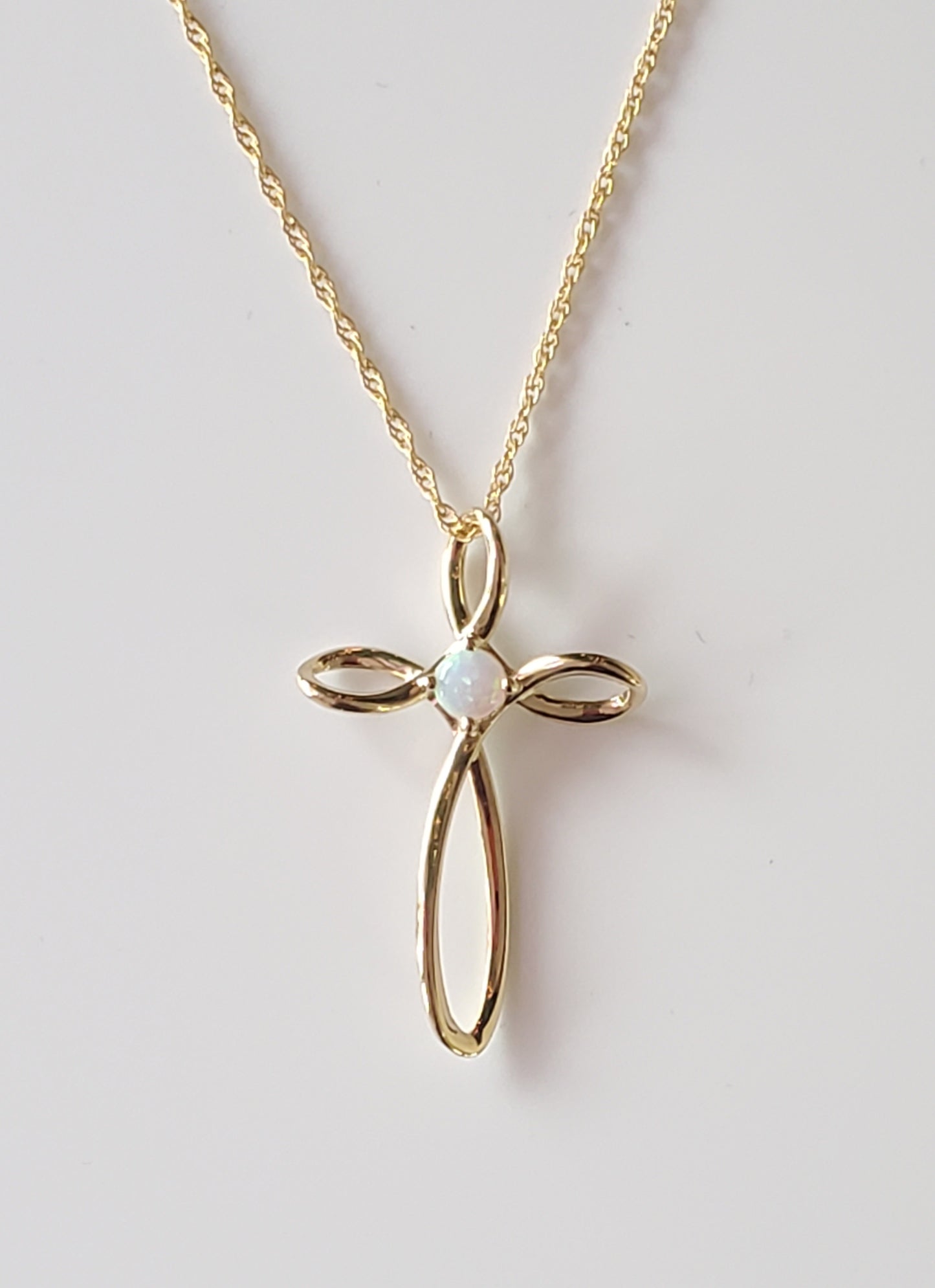 10k Yellow Gold Open Cross with Created Opal